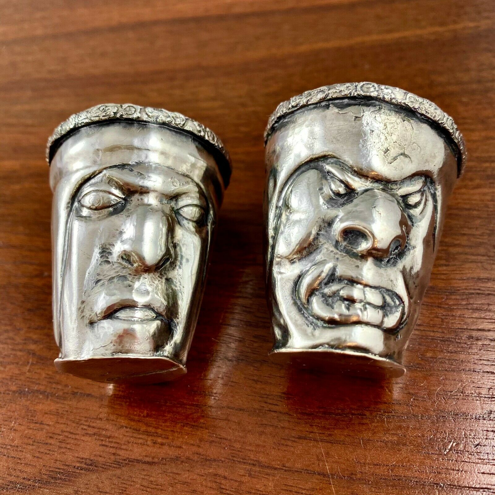 (2) Spanish Colonial? South American Silver Shot Cups Jiggers Masks Figural Face